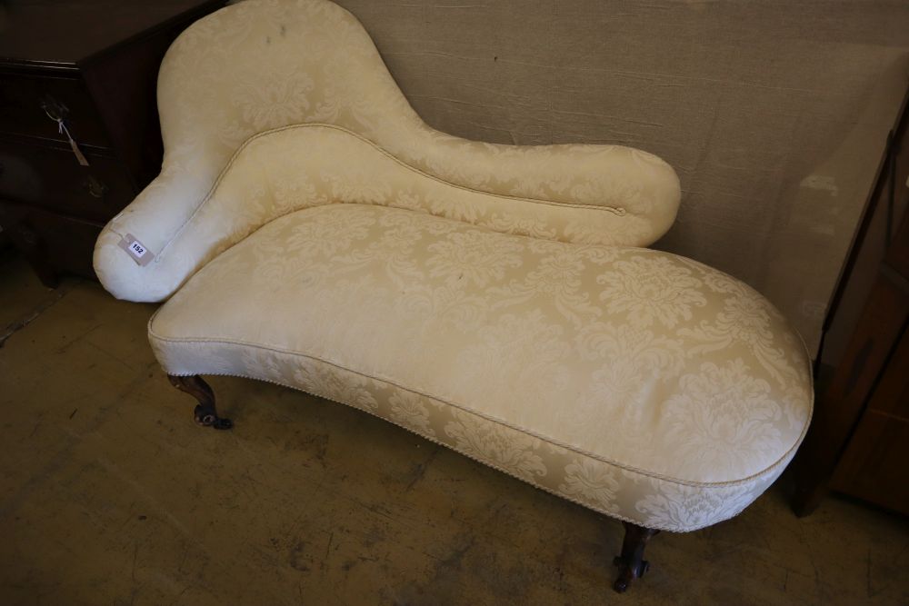 A Victorian walnut chaise longue, length 150cm